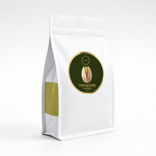 A white stand-up pouch of Pistachio Powder with a circular green and gold label on the front, set against a clean white background.