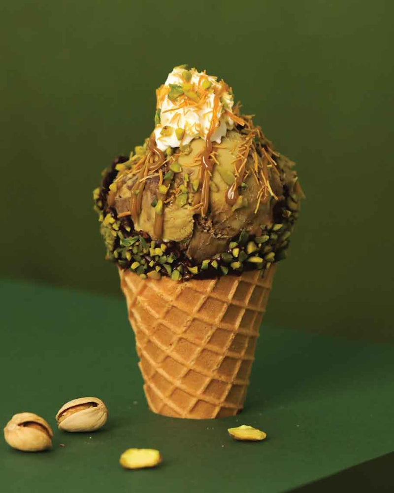 Ice cream cone from Inside Scoop with Delice pistachio granules.